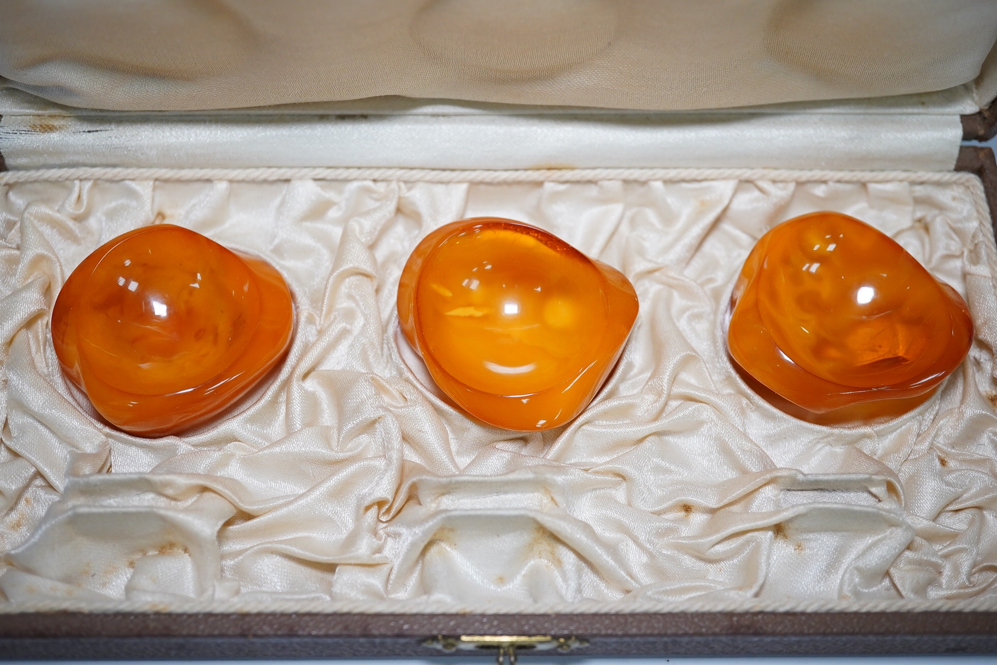 A group of assorted amber and other jewellery including carnelian necklace, glass bead necklace, aquamarine pebble necklace, etc. Condition - fair